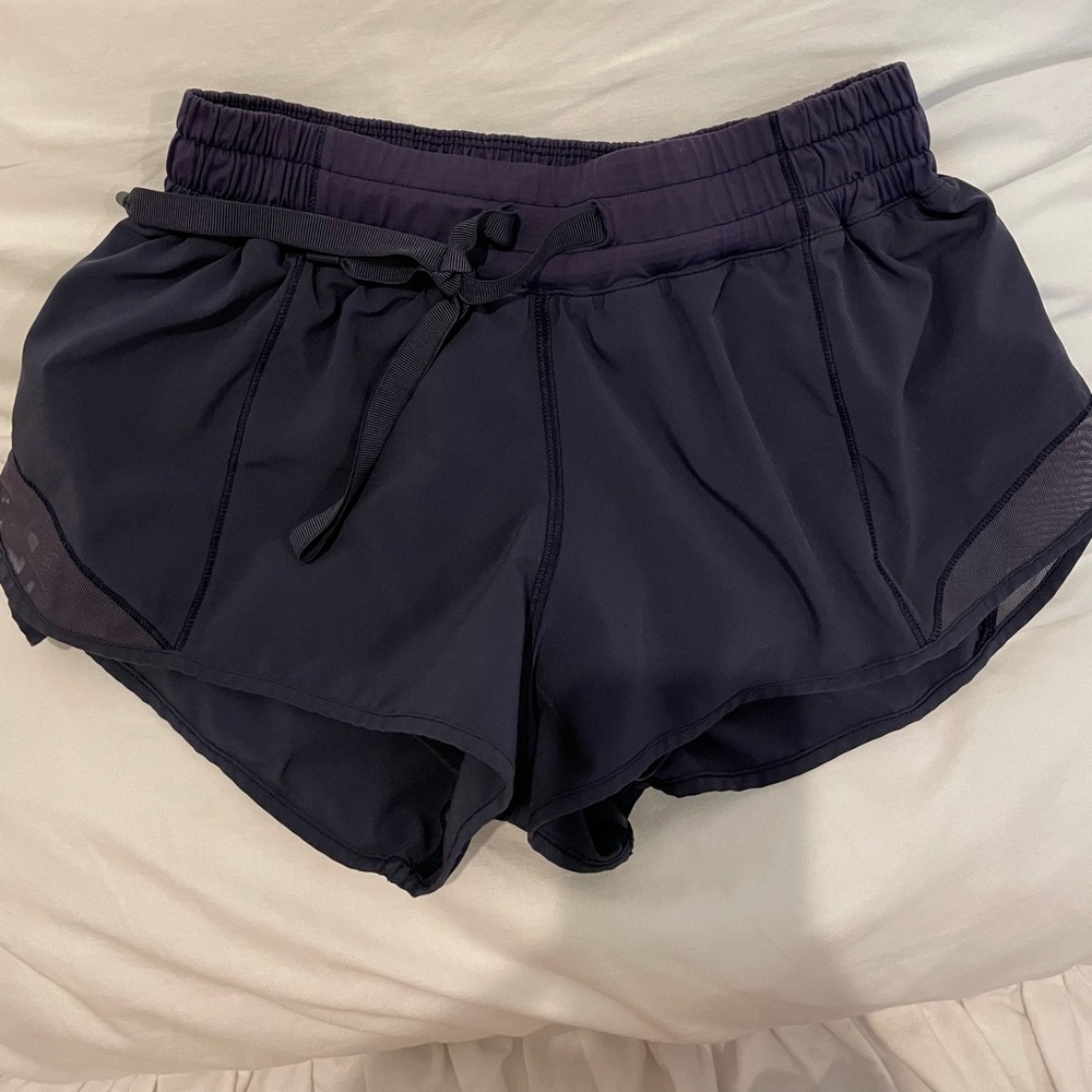 Dark purple Lululemon shorts, 2.5, size 6 but can fit like a 4